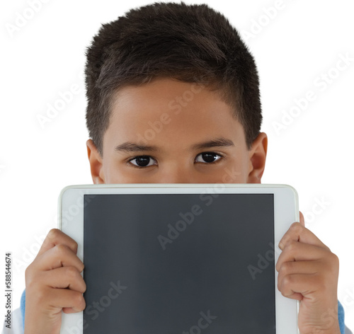 Portrait of schoolboy holding digital tablet