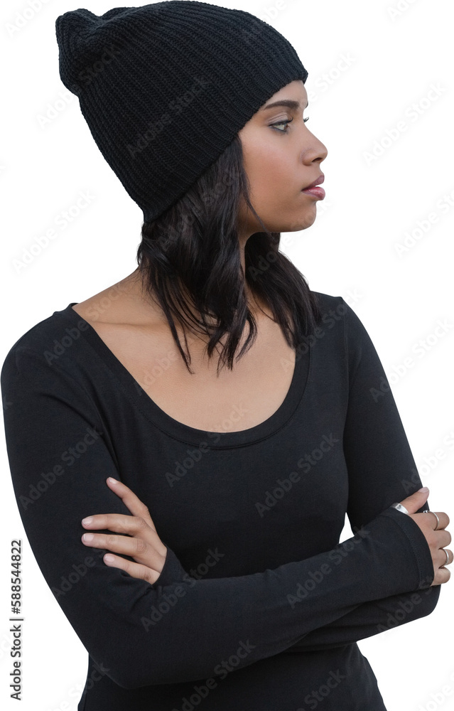 Fototapeta premium Thoughtful woman with arms crossed against white wall