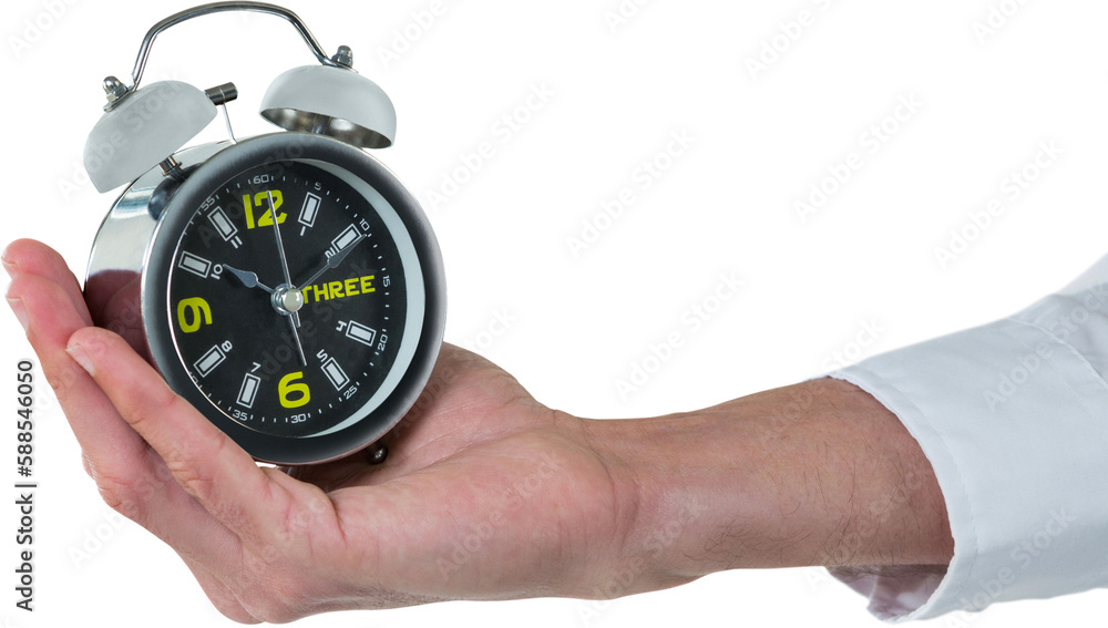 Cropped hand of male executive holding alarm clock Cropped hand of male executive holding alarm clock