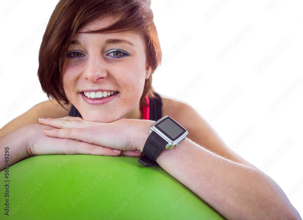 Portrait smiling woman resting on exercise ball Portrait smiling woman resting on exercise ball