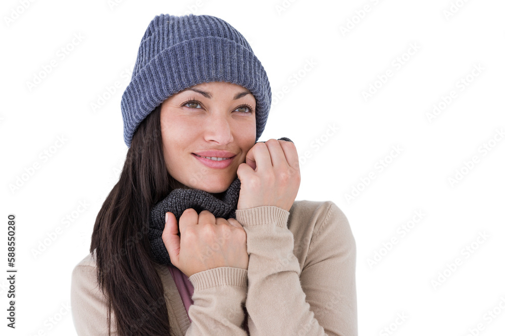 Attractive brunette looking up wearing warm clothes Attractive brunette looking up wearing warm clothes