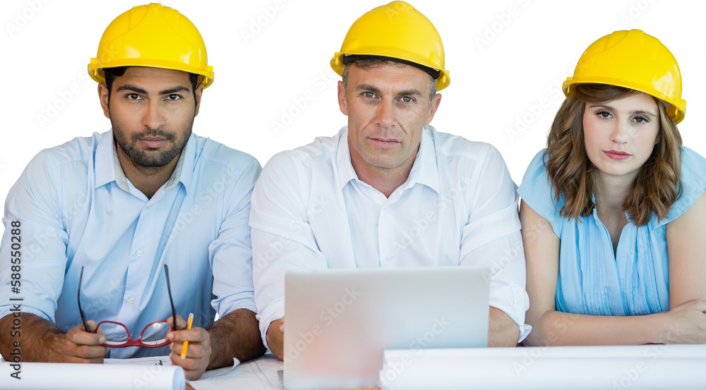 Portrait of architects wearing hardhats while sitting at table Portrait of architects wearing hardhats while sitting at table