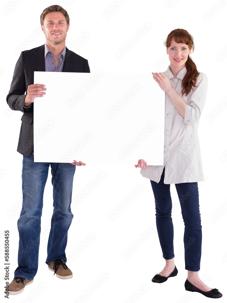 Smiling couple holding large sign Smiling couple holding large sign