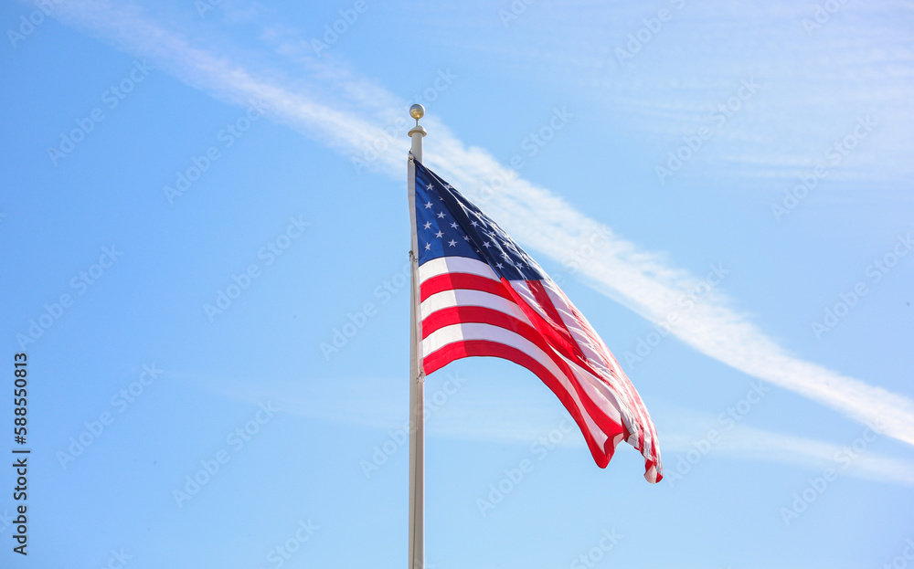 The US flag on a pole is a symbol of patriotism and unity, representing the country's values, history, and people. Its design and colors have symbolic meaning The US flag on a pole is a symbol of patriotism and unity, representing the country's values, history, and people. Its design and colors have symbolic meaning