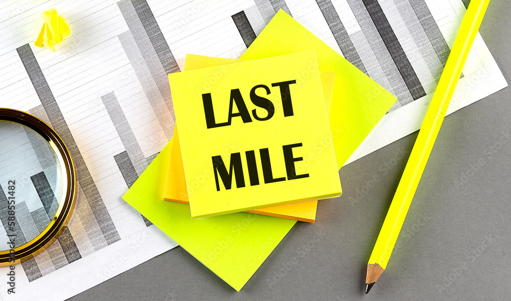 LAST MILE text on sticky on sticky on chart with pen LAST MILE text on sticky on sticky on chart with pen