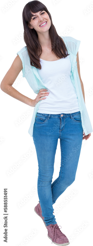 Obraz premium Portrait of happy woman standing with hand on waist