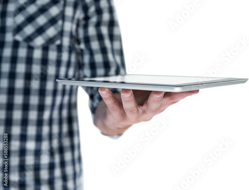 Midsection of man holding digital tablet