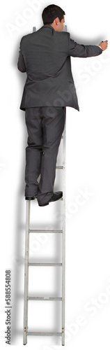 Businessman standing on ladder