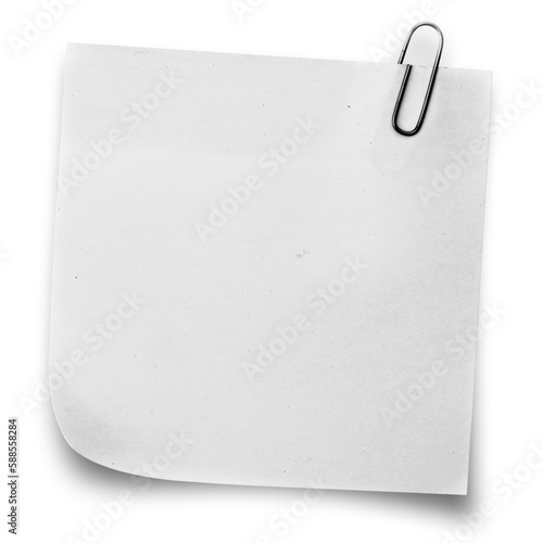 White sticky note with paper clip