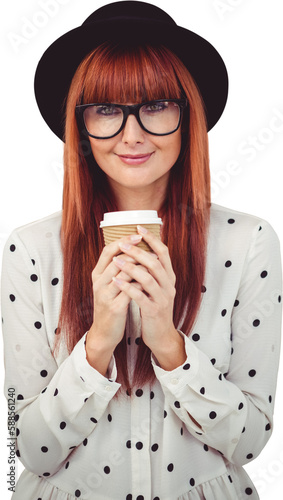 Smiling hipster woman drinking coffee