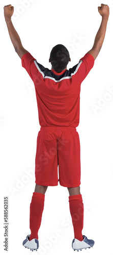 Football player in red cheering