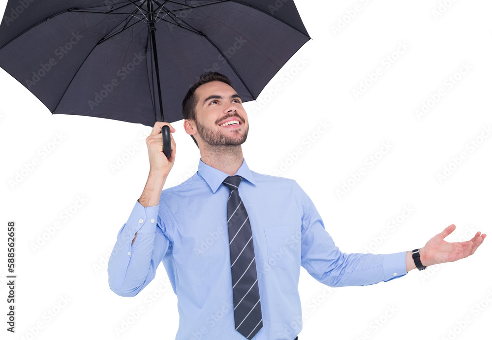 Happy businessman sheltering with a black umbrella Happy businessman sheltering with a black umbrella