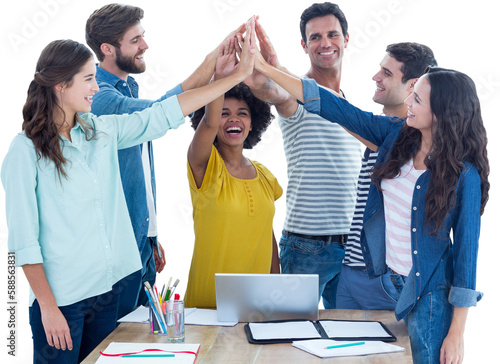 Group of young colleagues using laptop 
