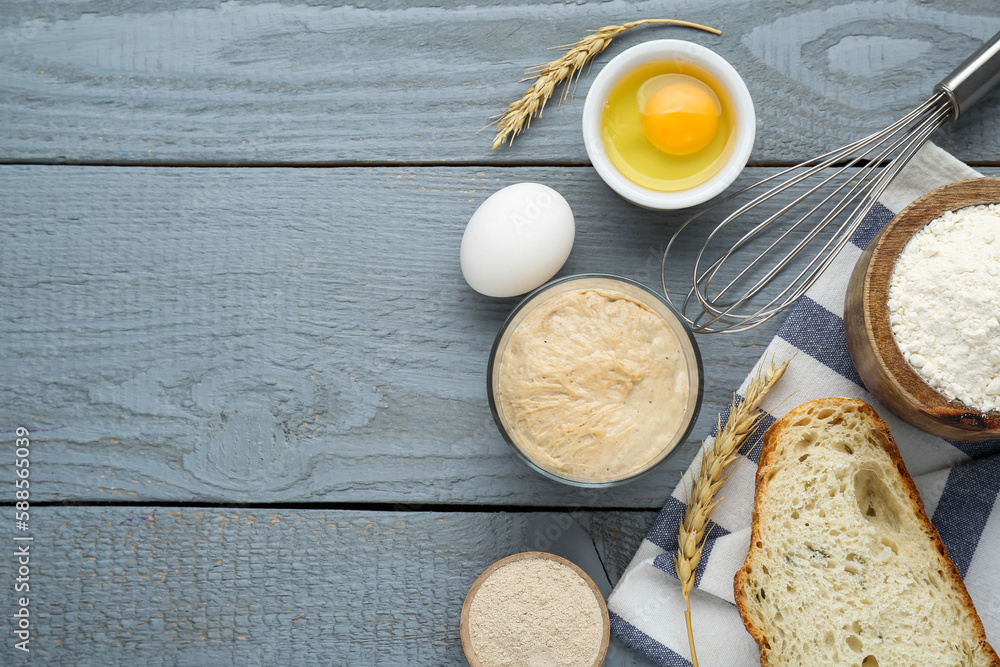 Flat lay composition with sourdough on grey wooden table. Space for text Flat lay composition with sourdough on grey wooden table. Space for text