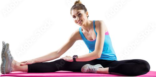 Portrait of athlete stretching on exercise mat