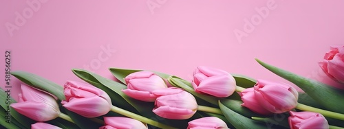 Pink tulip bouquet on matching background for Mother s Day