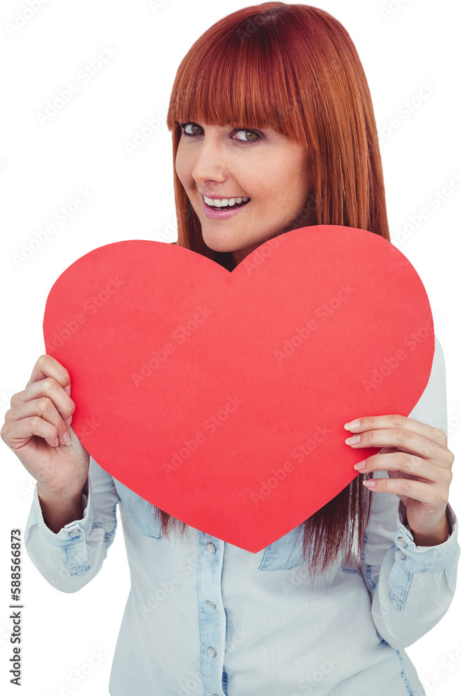 Attractive hipster woman behind a red heart Attractive hipster woman behind a red heart
