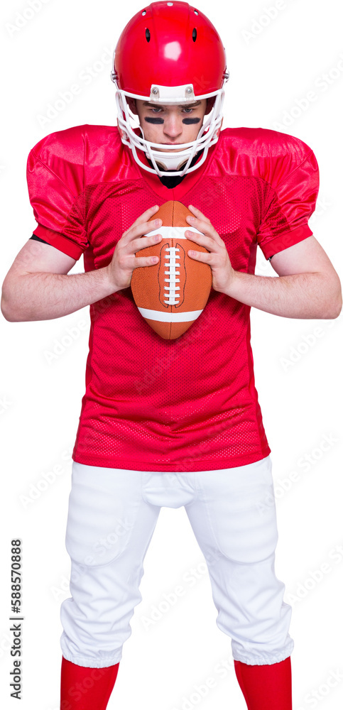 American football player holding a ball American football player holding a ball