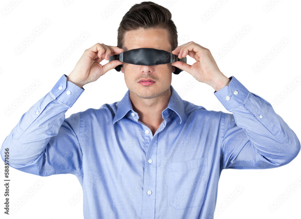 Young man wearing virtual reality simulator Young man wearing virtual reality simulator