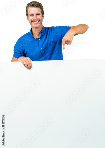 Smiling man holding white placard