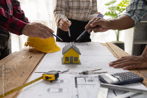 Engineer Teamwork Meeting, Architect contractor meetings of real estate brokers and company presidents to select a model to build a housing estate in writing and presenting to state organizations.