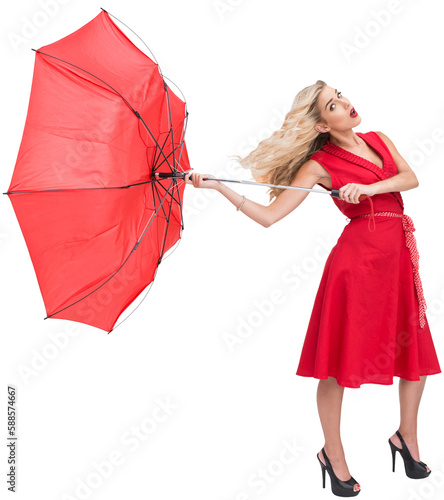 Elegant blonde holding umbrella