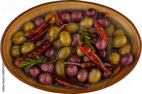 Olives with oil and chili pepper in bowl
