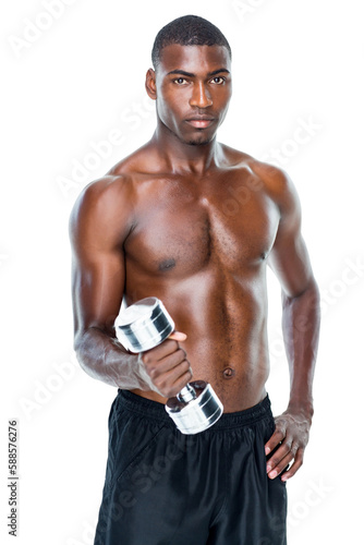 Portrait of a fit shirtless young man lifting dumbbell