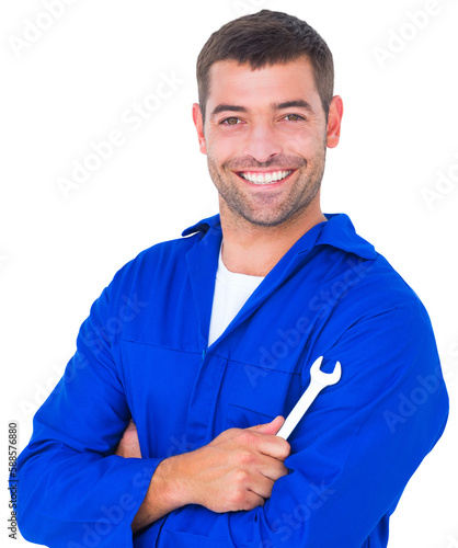 Happy mechanic holding spanner on white background