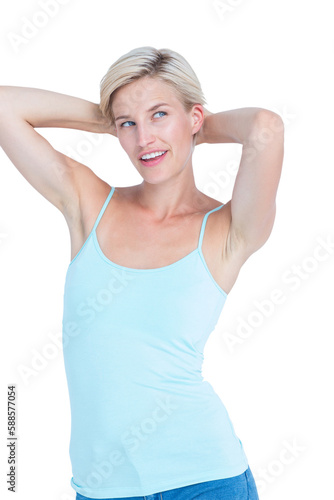 Attractive blonde woman with hands on head 