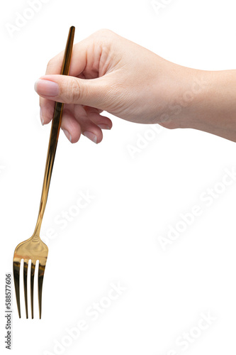 isolated of a woman's hand holding a golden fork.