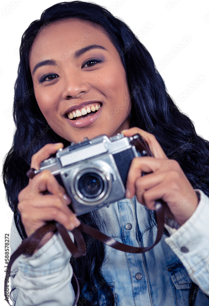 Asian woman holding digital camera Asian woman holding digital camera