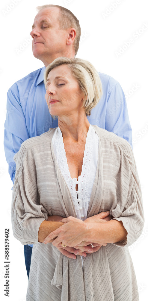 Happy mature couple embracing with eyes closed Happy mature couple embracing with eyes closed