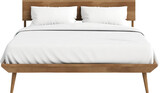 Mid-century wooden double bed. Scandinavian style double bed with white blanket and pillows.