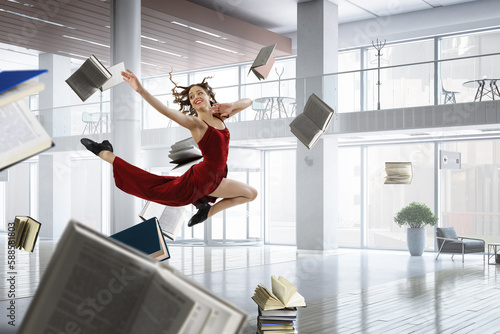 Female dancer against office background