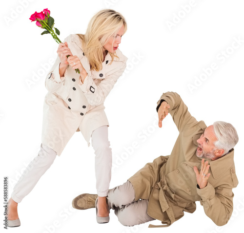 Angry wife hitting with rose bouquet to husband