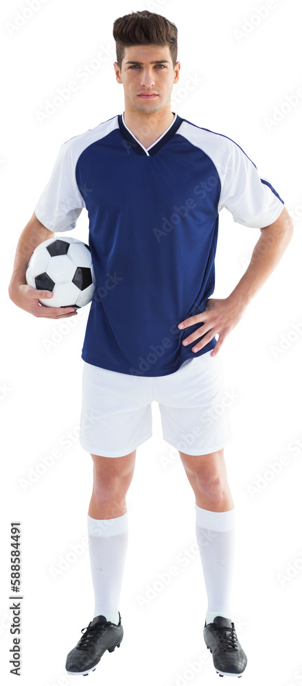 Sportsman holding football while one hand on waist Sportsman holding football while one hand on waist