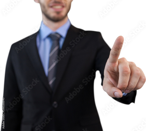 Mid section of businessman in suit selecting over invisible interface