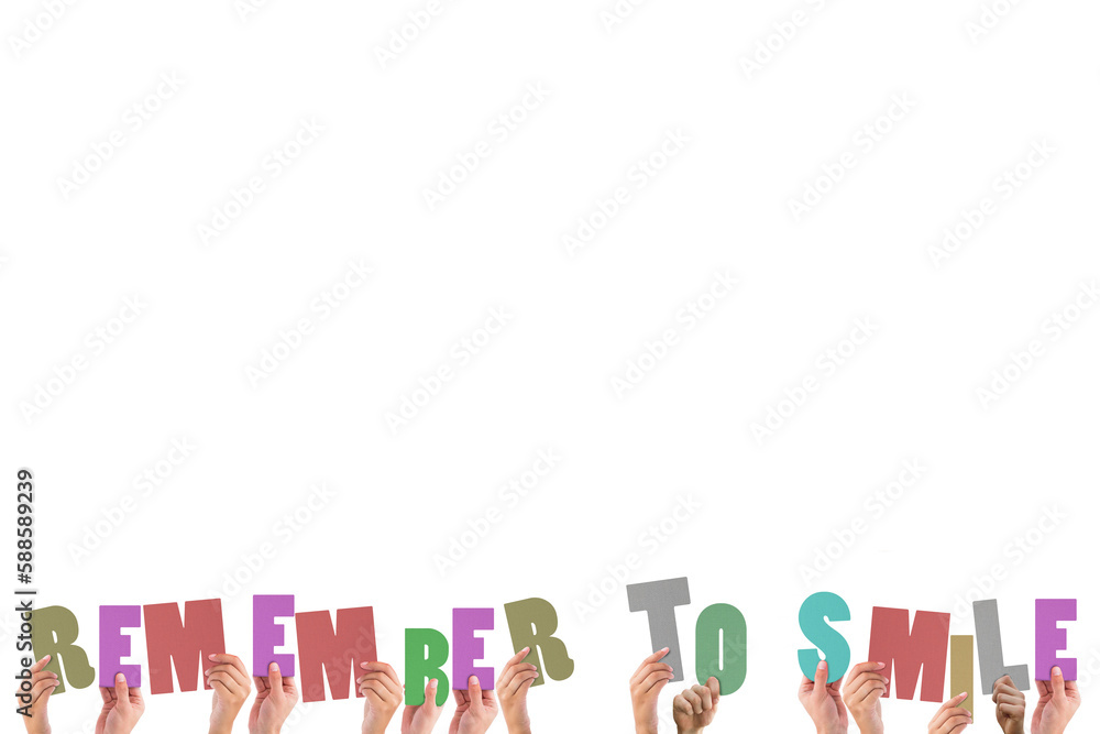 Colorful alphabet spelling remember to smile held up by people Colorful alphabet spelling remember to smile held up by people