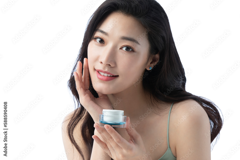 Young beautiful Chinese woman putting on make up Young beautiful Chinese woman putting on make up