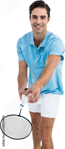 Badminton player holding a racquet ready to serve 