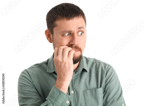 Handsome man in shirt biting nails on white background, closeup