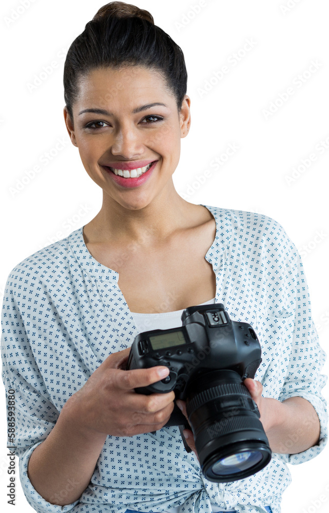 Portrait of smiling young woman holding digital camera Portrait of smiling young woman holding digital camera