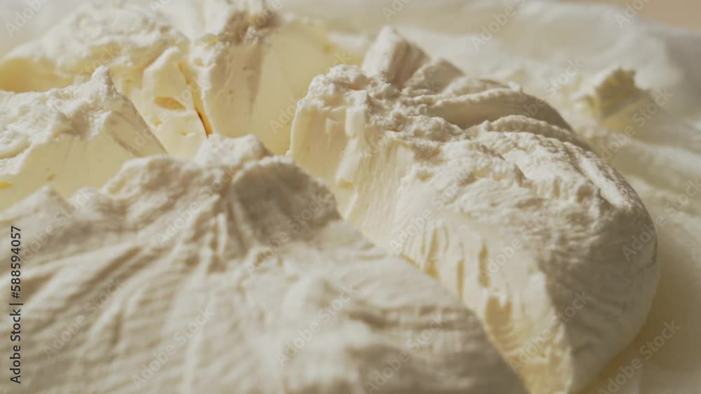 Fresh homemade dairy ricotta cheese, close-up opening white net bag Fresh homemade dairy ricotta cheese, close-up opening white net bag