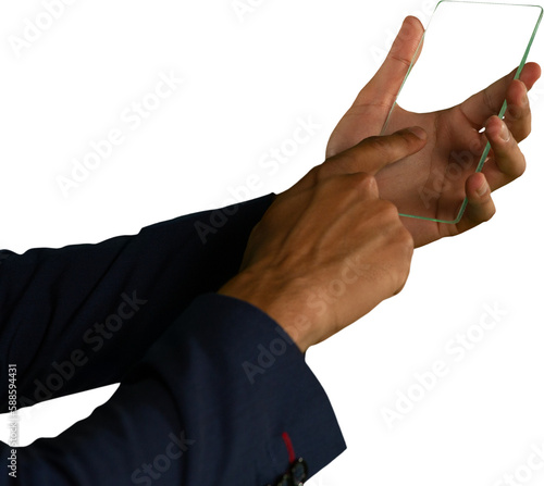 Mid section of man touching glass sheet