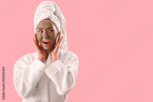 Happy young woman with appl...