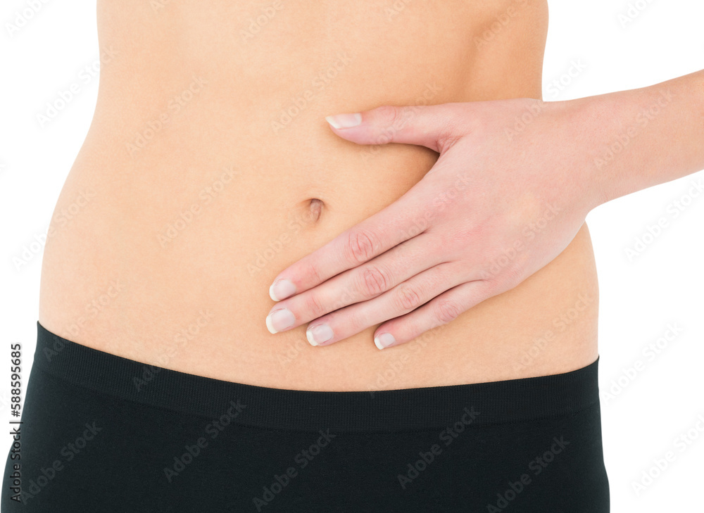 Closeup mid section of a fit woman with stomach pain Closeup mid section of a fit woman with stomach pain
