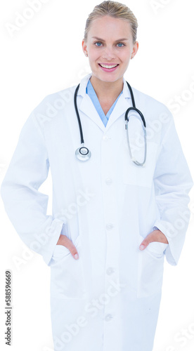Portrait of smiling female doctor standing hands in pockets