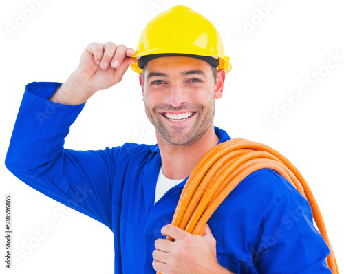 Confident repairman wearing hard hat while holding wire roll