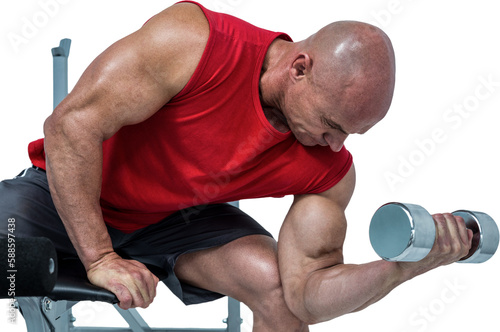 Bald man exercising with dumbbells while sitting on bench press